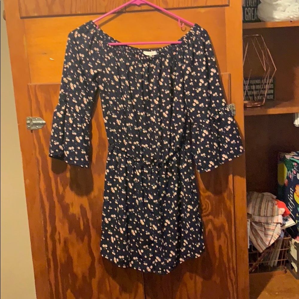 Off the shoulder navy floral romper from Dry Goods